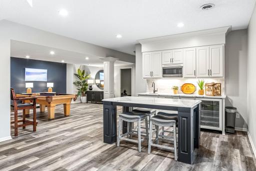 Lower level kitchen complete with an open concept floorplan