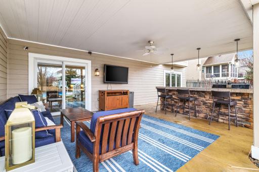 Covered outdoor kitchen and entertaining area