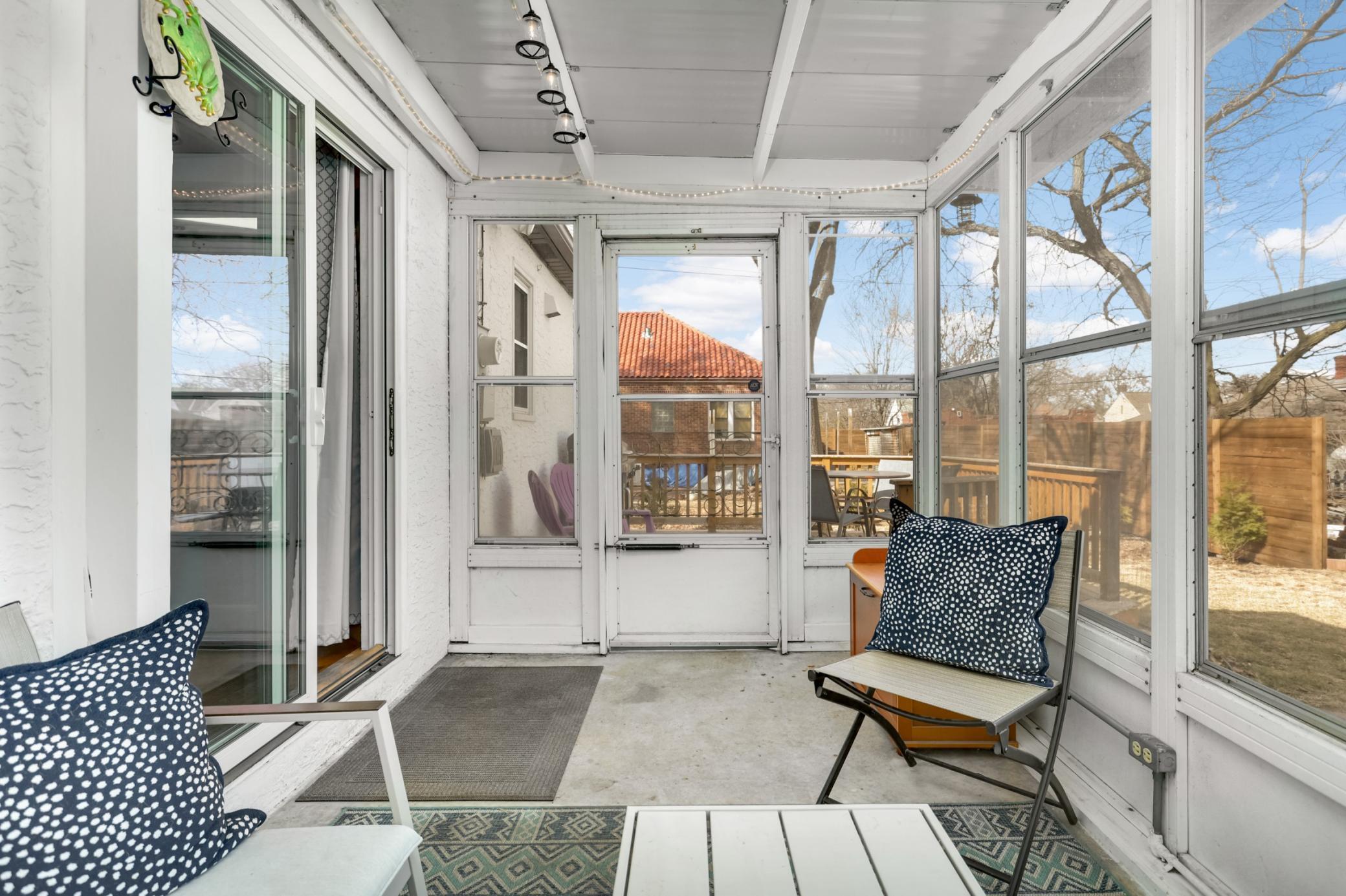 The porch leads right out to the deck - BBQ season is here!