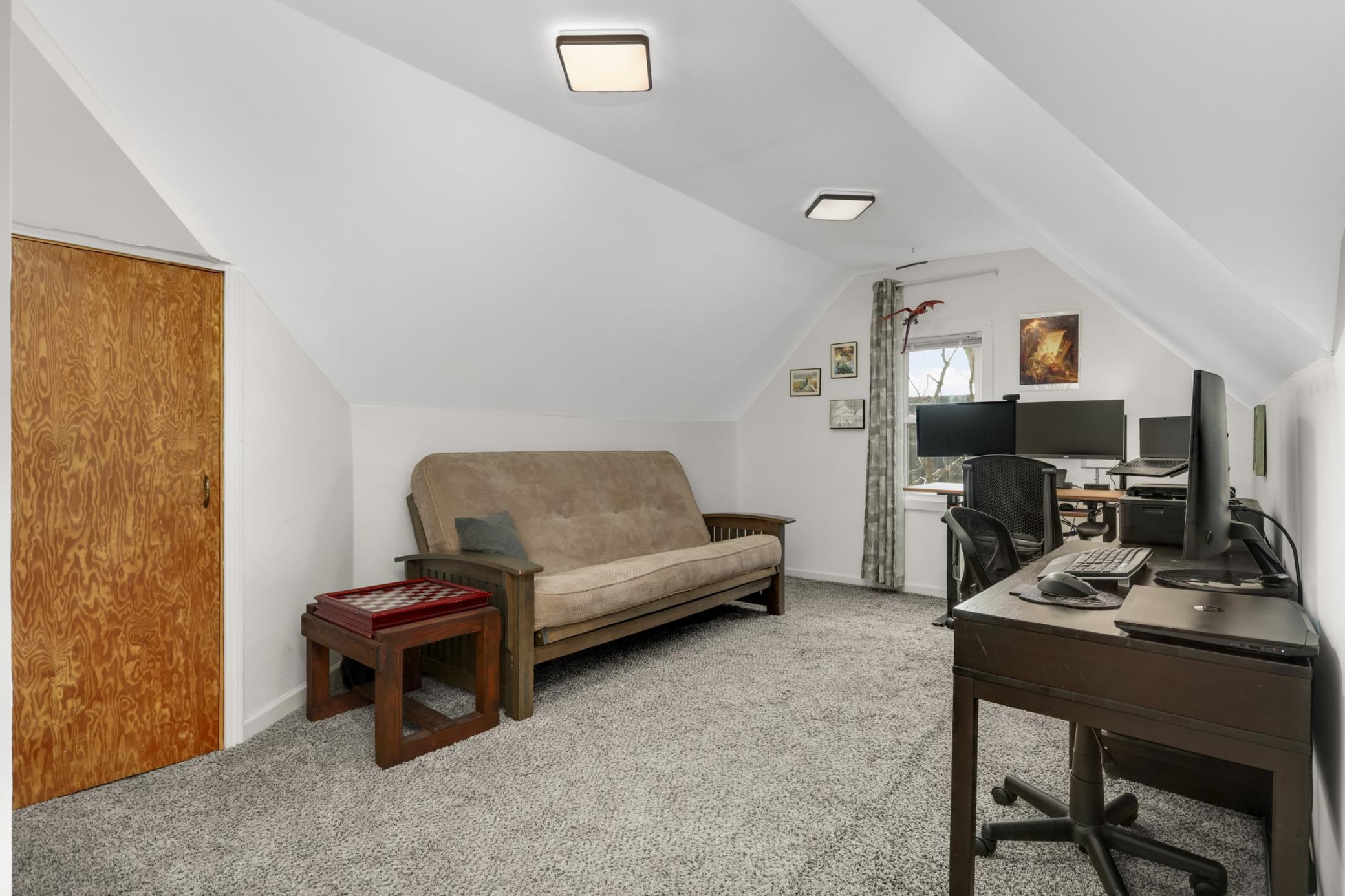 The 4th bedroom is being used as a home office and features a large walk-in closet.