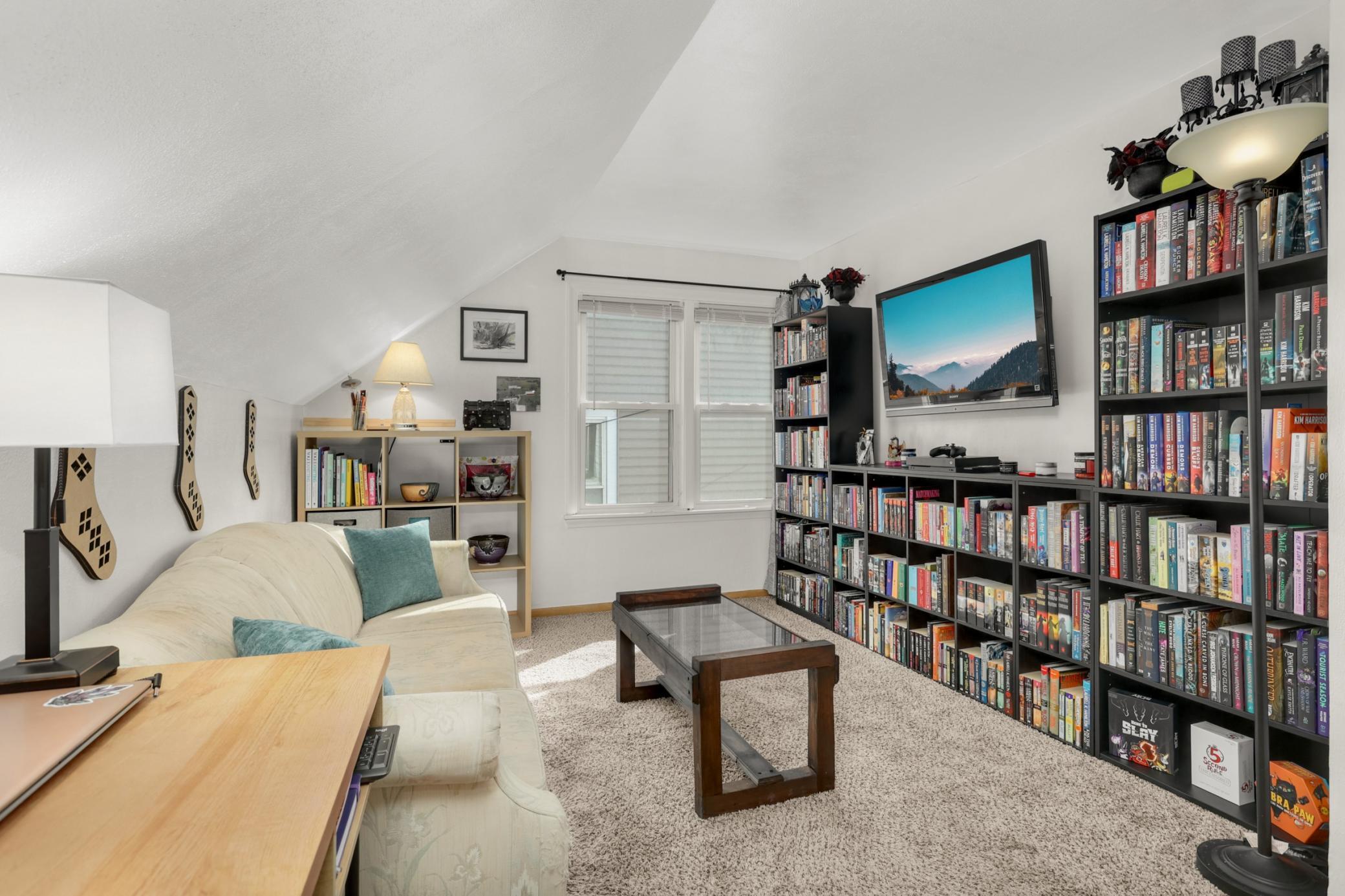 Bedroom three is being used as a den/library and features plenty of room for a king-sized bed.