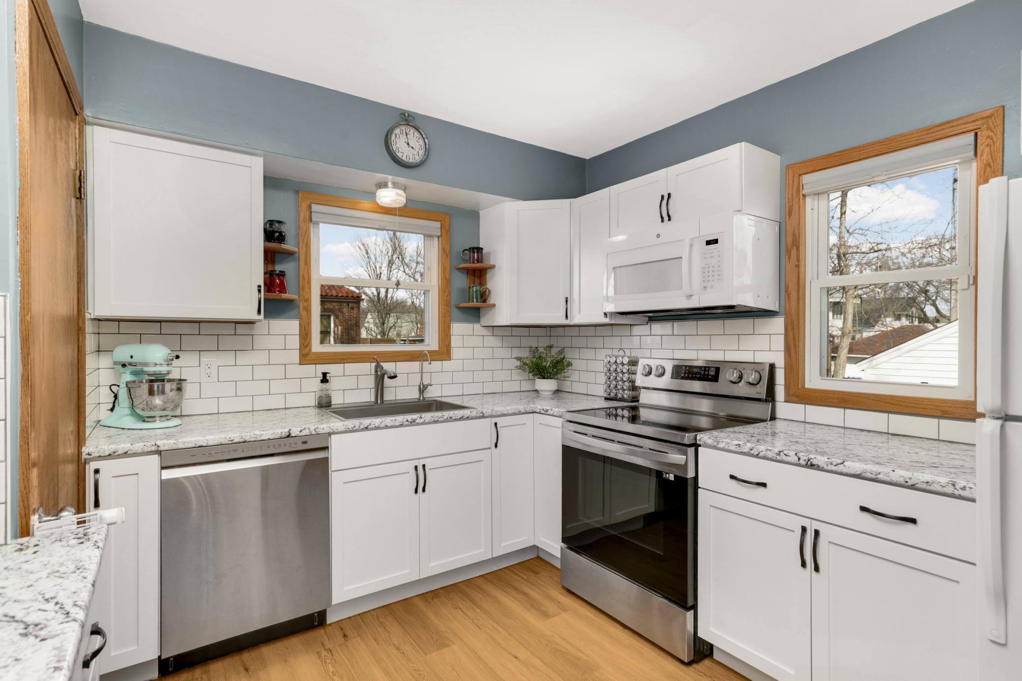 Don't miss the farm sink and subway tile backsplash.