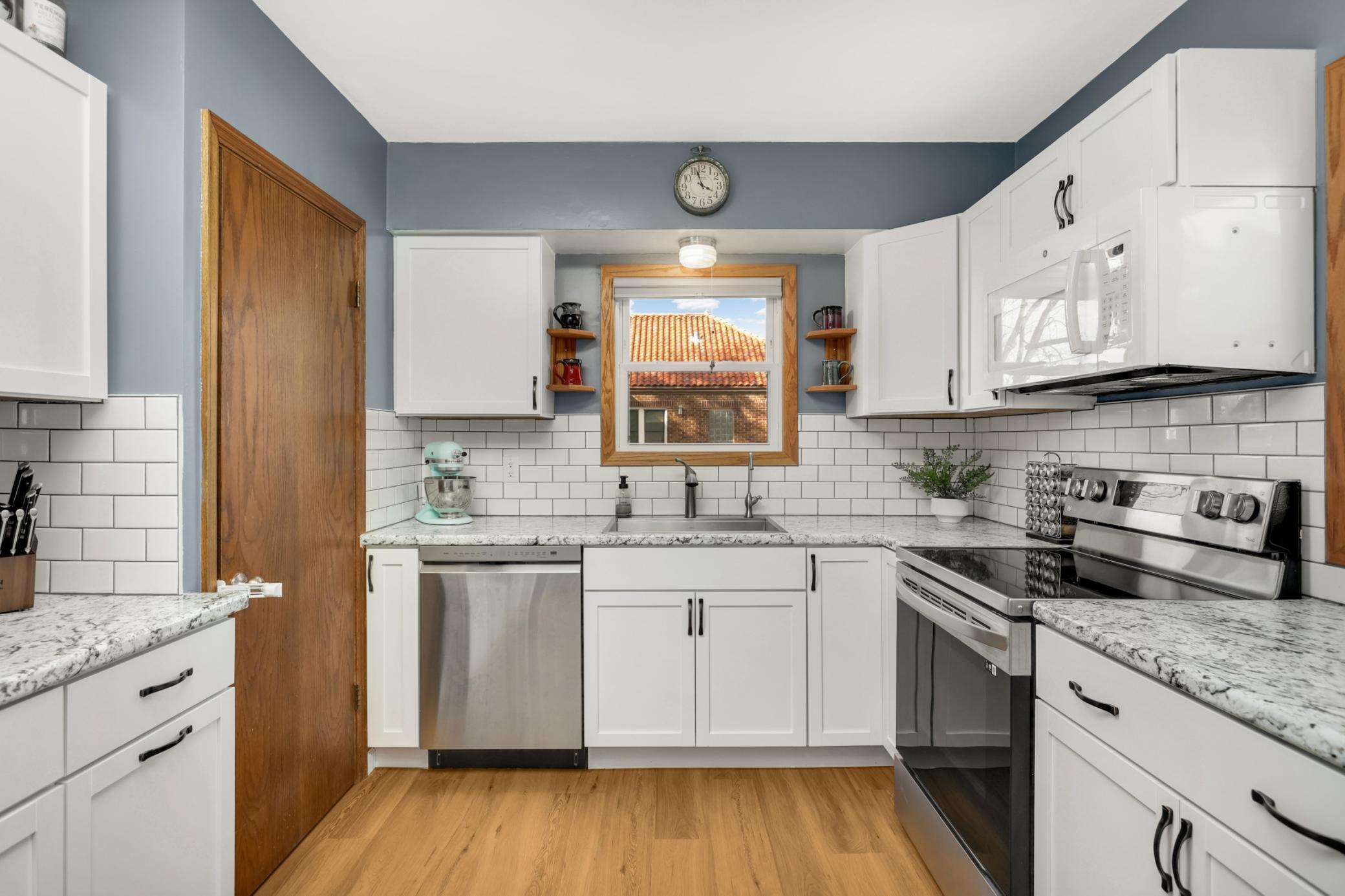 Cooking in this kitchen will be so much fun - there is so much counter space and storage.