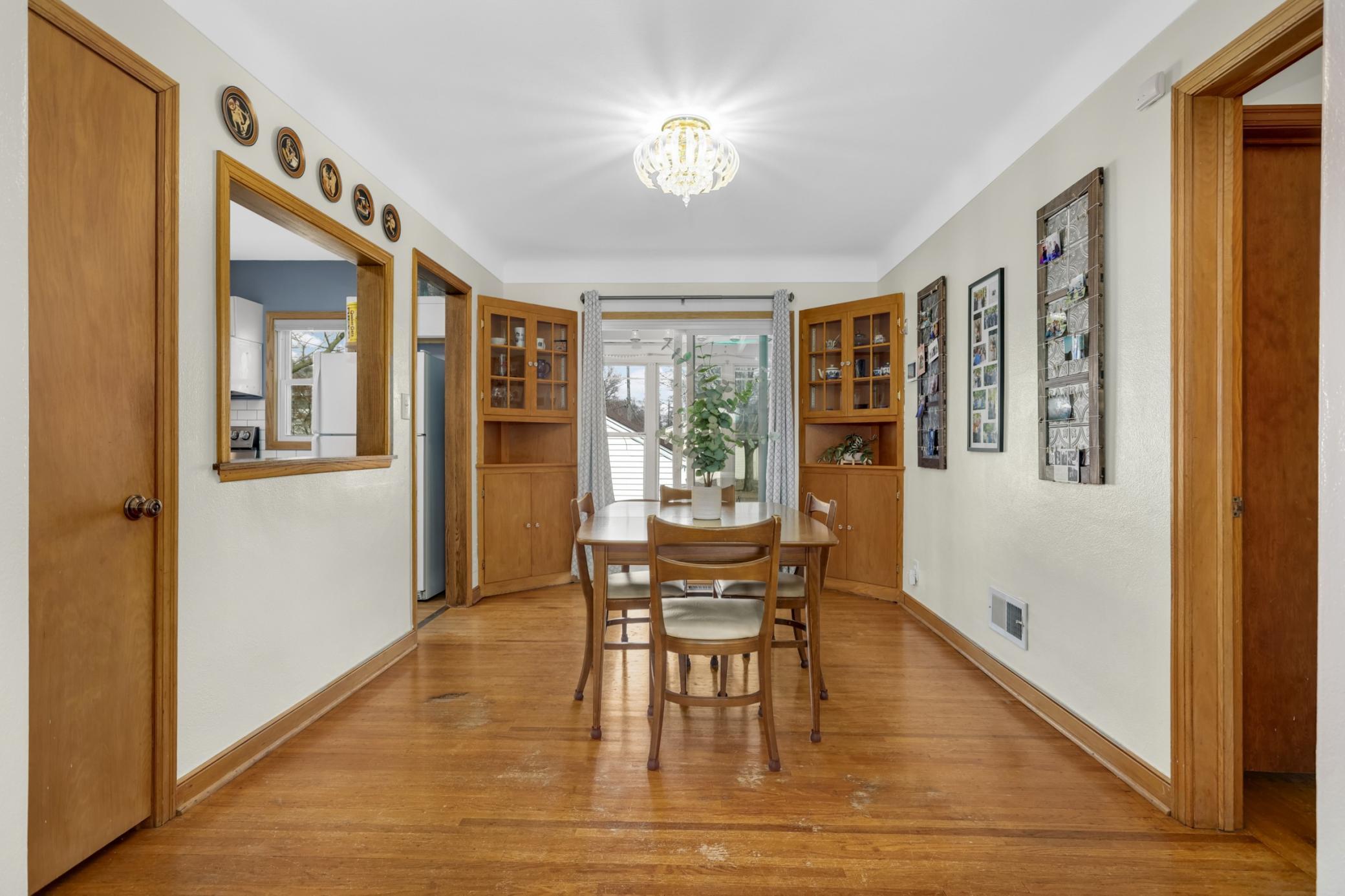 The built-in hutches in the dining room are practical and pretty.