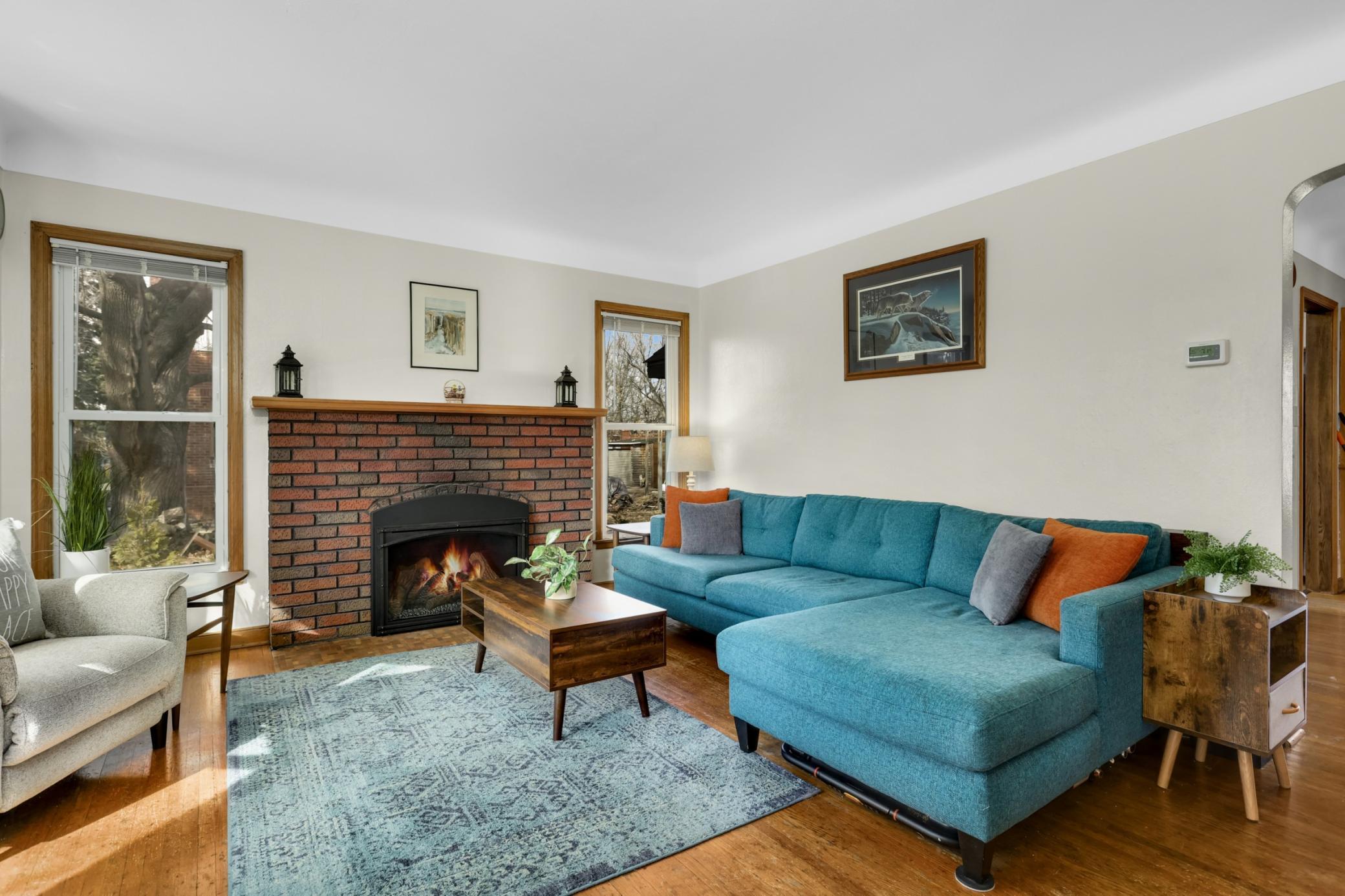 The living room is drenched in great natural light.