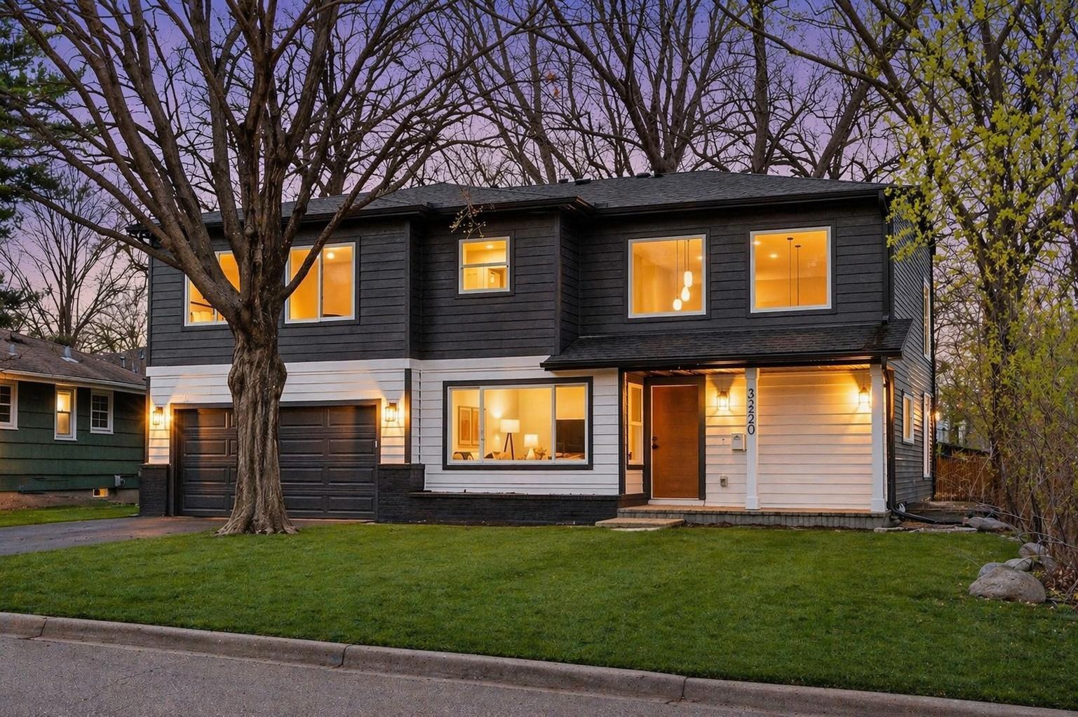 Beautiful modern design. This lead photo is enhanced to show a mature lawn. Front yard is currently seeded, and has a straw mat cover and temporary irrigation. Photo #42 shows current lawn status.