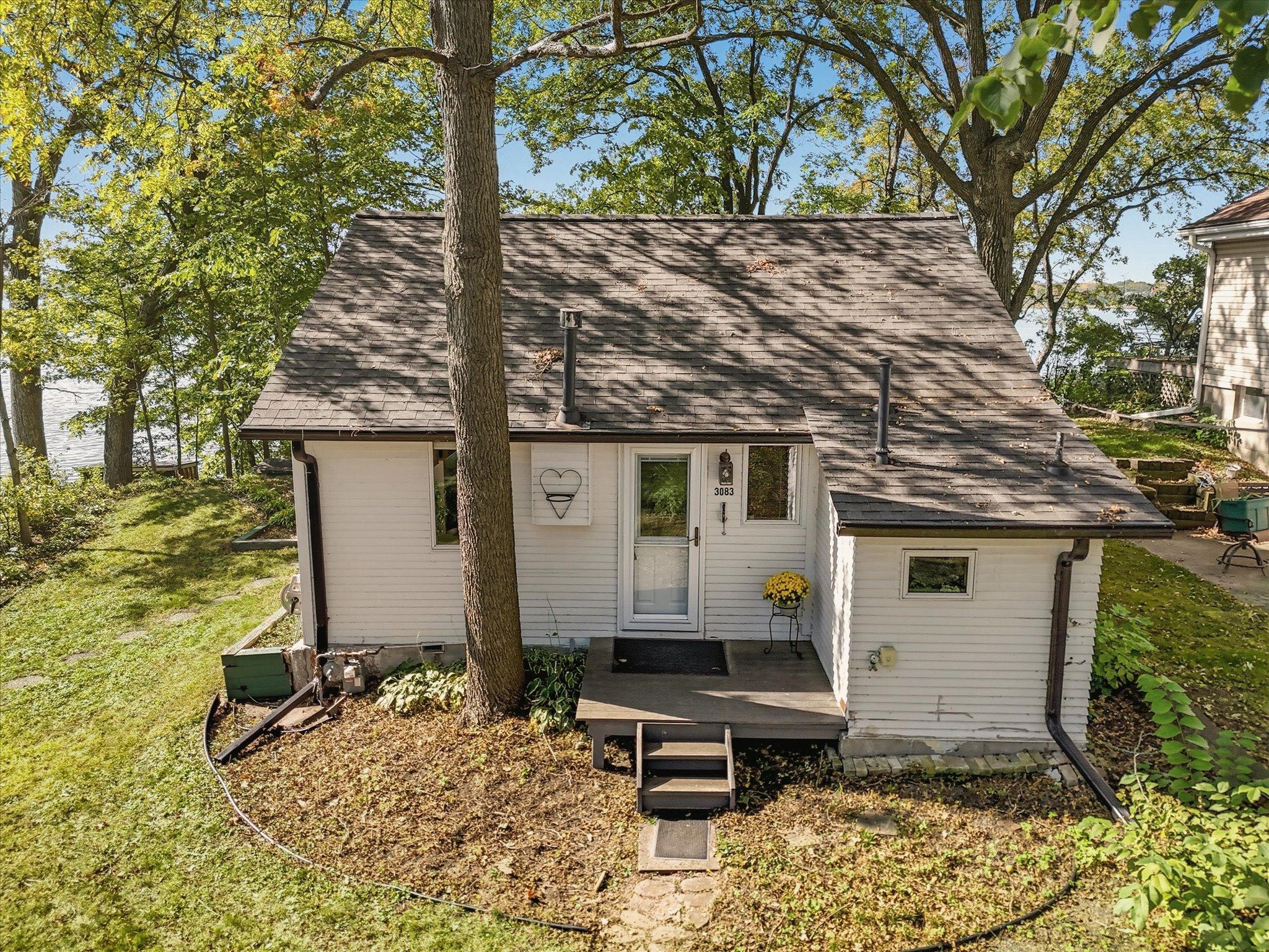 Cabin from street side to lake