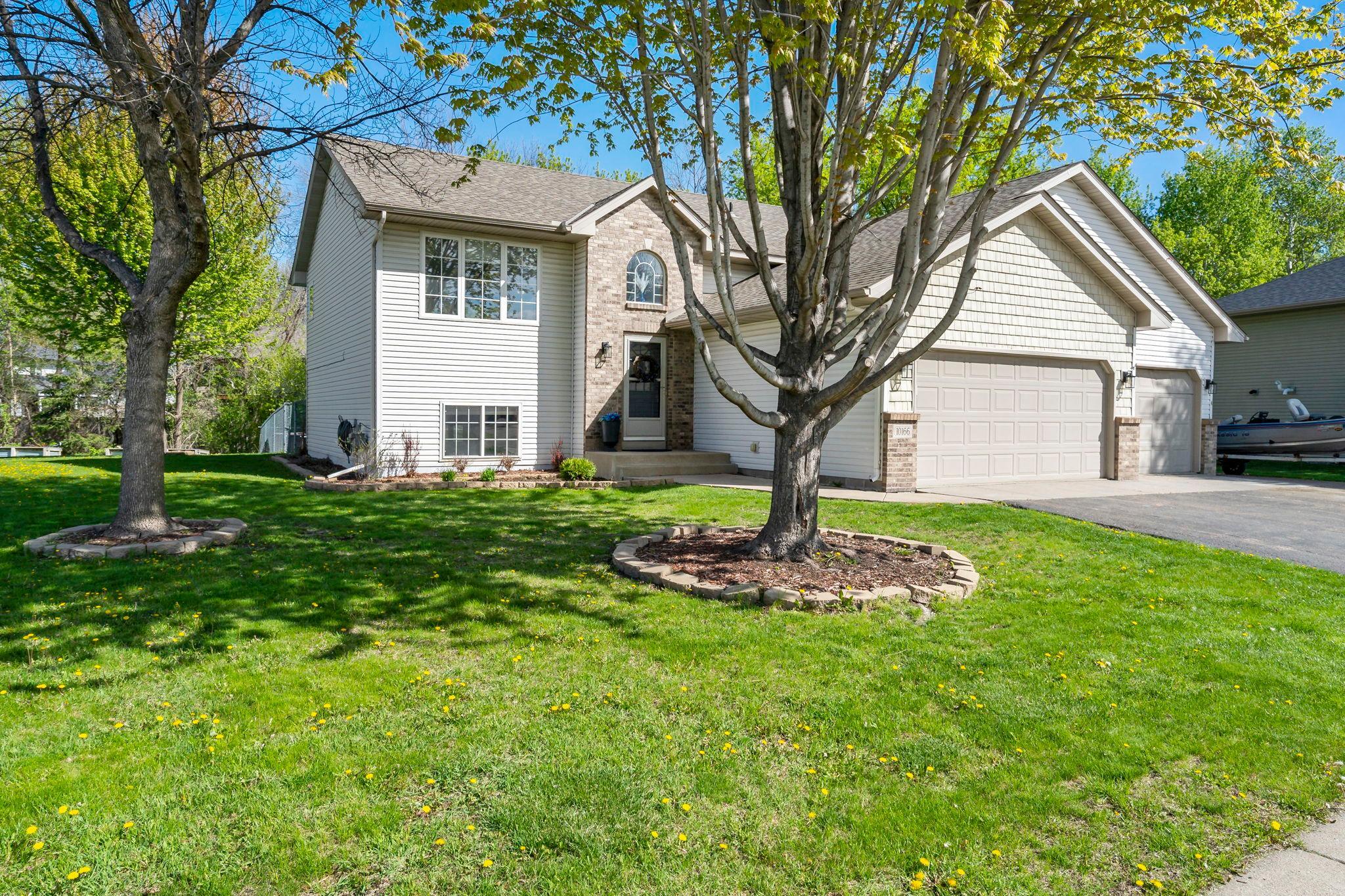 Welcome Home! 10166 - 46th Place N.E. in St. Michael. 3 BR, 2 BA, 3 car heated garage