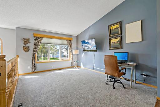 Living room Lots of sunlight, vaulted ceilings and brand new carpet
