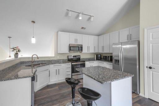 2.1 Another kitchen view. Note the newer flooring..JPG