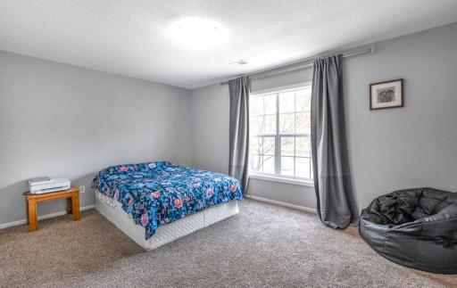 8 2nd bedroom on the main level. Spacious!.JPG