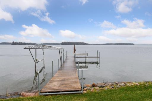 Please note the dock will stay however the boat lift, boat house and kayak lift will not convey.
