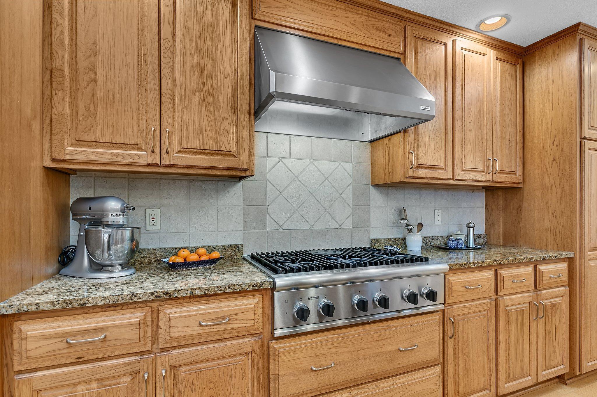 Gourmet kitchen Thermador gas stove