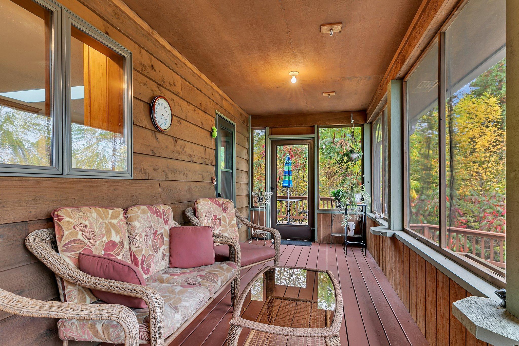 Huge screened porch overlooking back yard