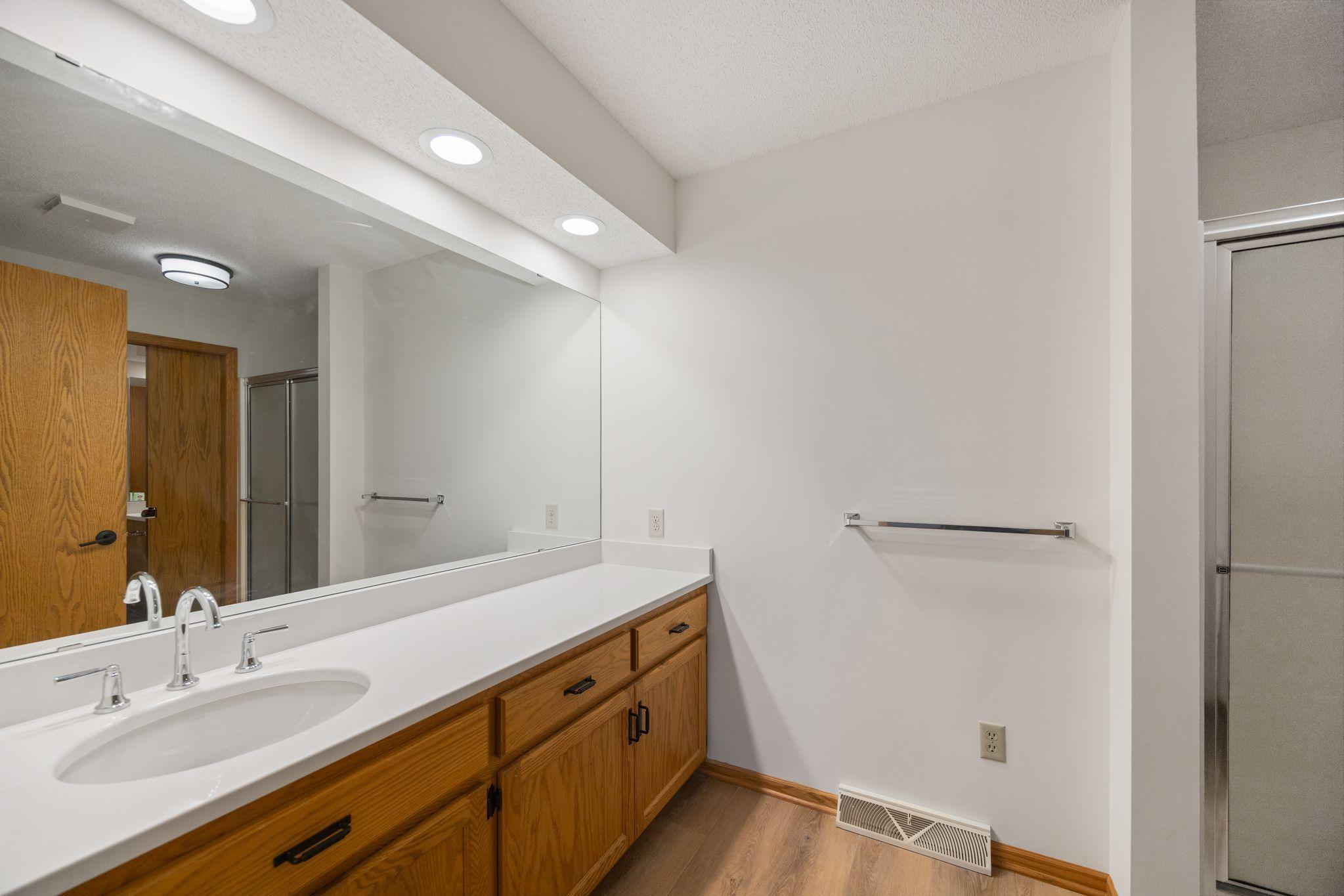 Primary Bathroom with shower - walks through to main level bathroom with bath/shower combo
