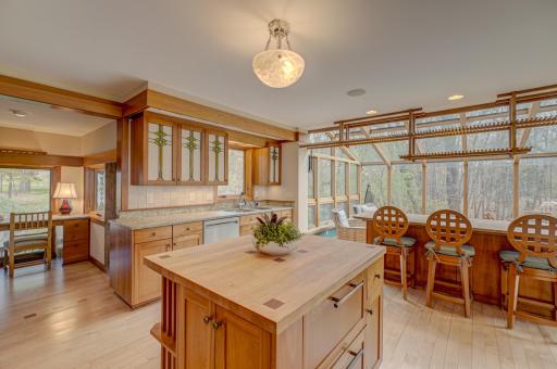 The Frank Lloyd Wright-style stained glass design is reiterated throughout the home.
