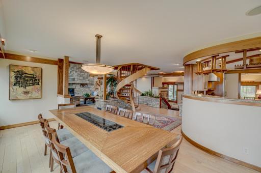 The York spiral staircase was custom built in Maine and meticulously assembled and installed. Note the design consistency with the curve of the kitchen wall.