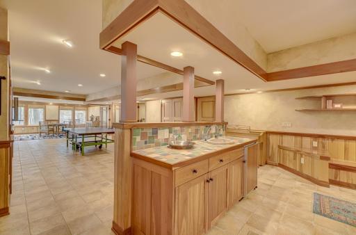 The convenient wet bar with built-in fridge.