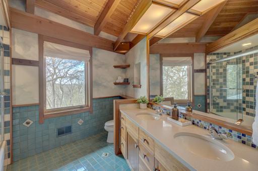 The colorful and fun tiled bathroom in the upper level hallway.