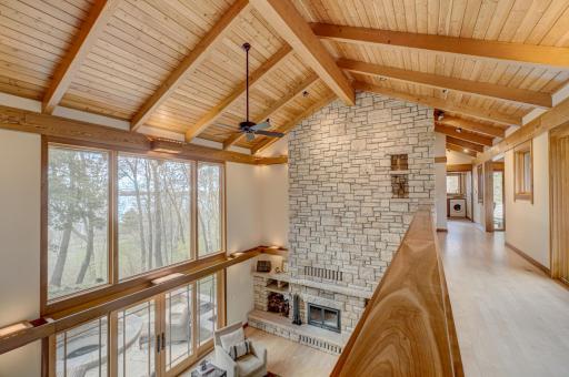 The vertical spaciousness of this home is grand, yet each room is scaled to create an inviting welcome.