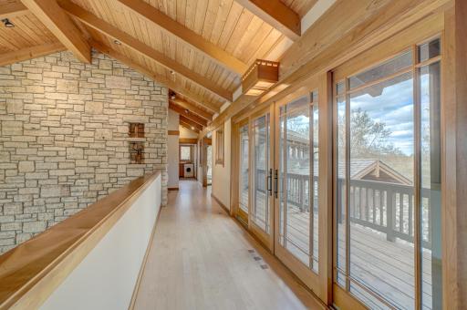 There are decks along the east on both main and upper levels.