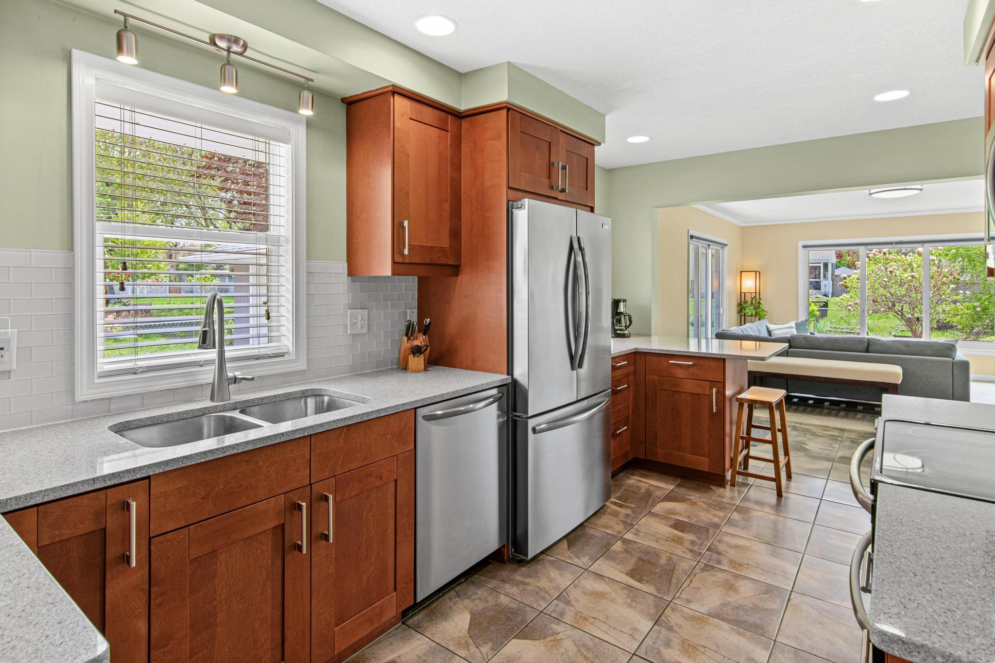 The kitchen opens up to the main floor family room. This is sure to be one of your favorite spaces in the house and there is plenty of space for multiple cooks to work in here at the same time.
