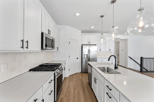 (All the following photos are of a similar home, actual finishes may vary.)