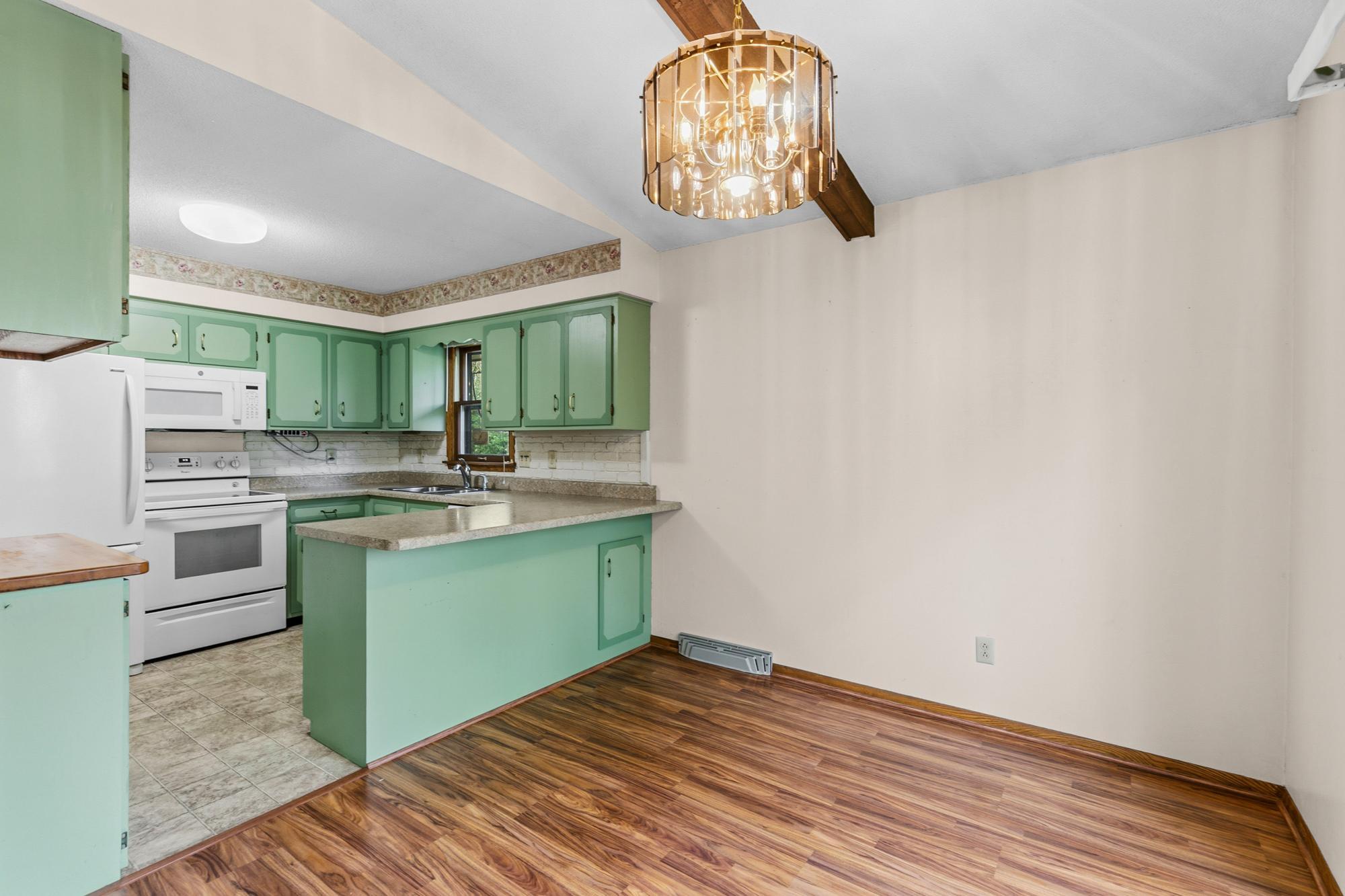 The compact, but efficient kitchen has gorgeous views to both the east and the north.