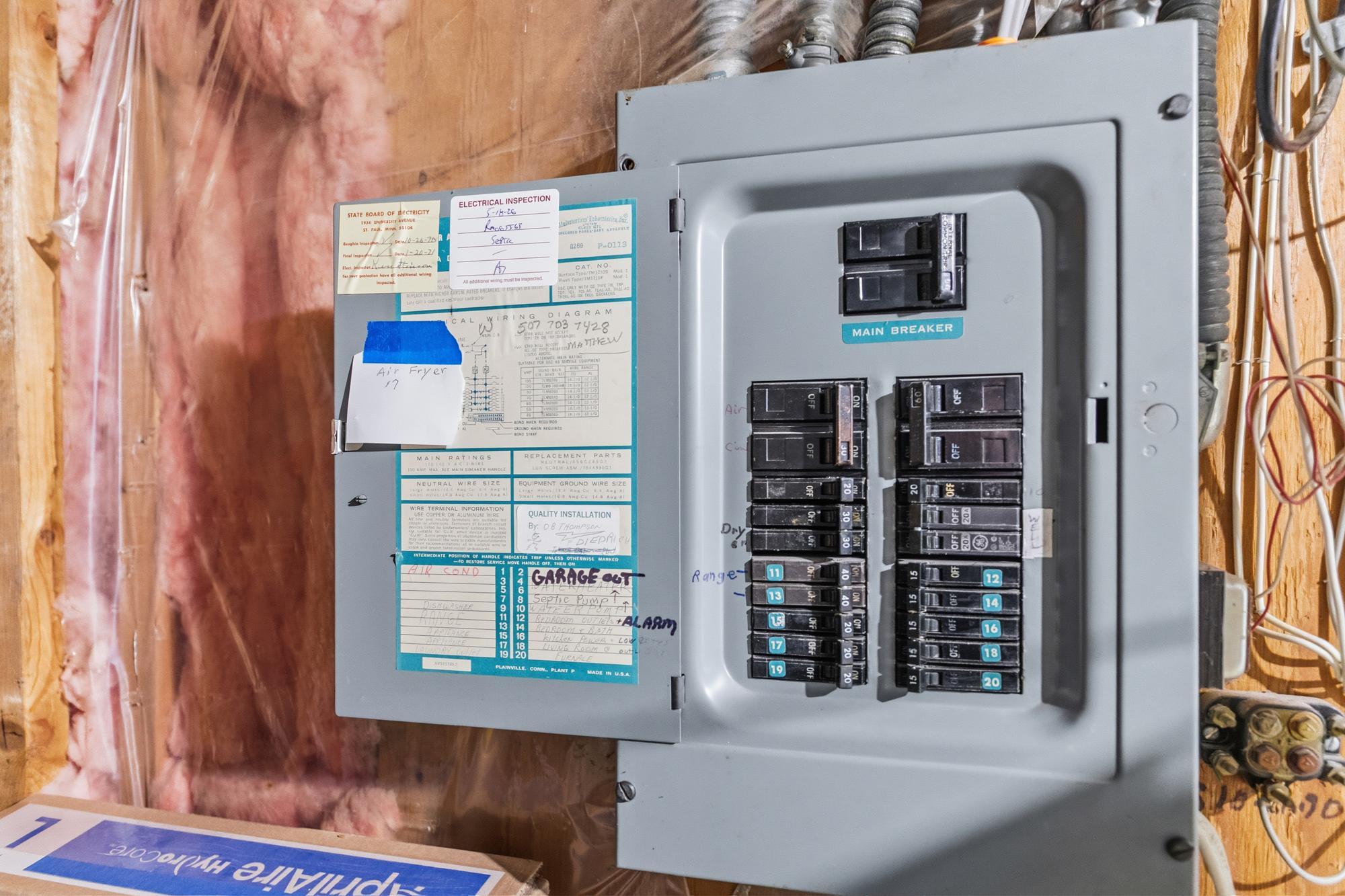 The main electrical box is located in the laundry area of the home. The secondary garage runs on a subpanel.