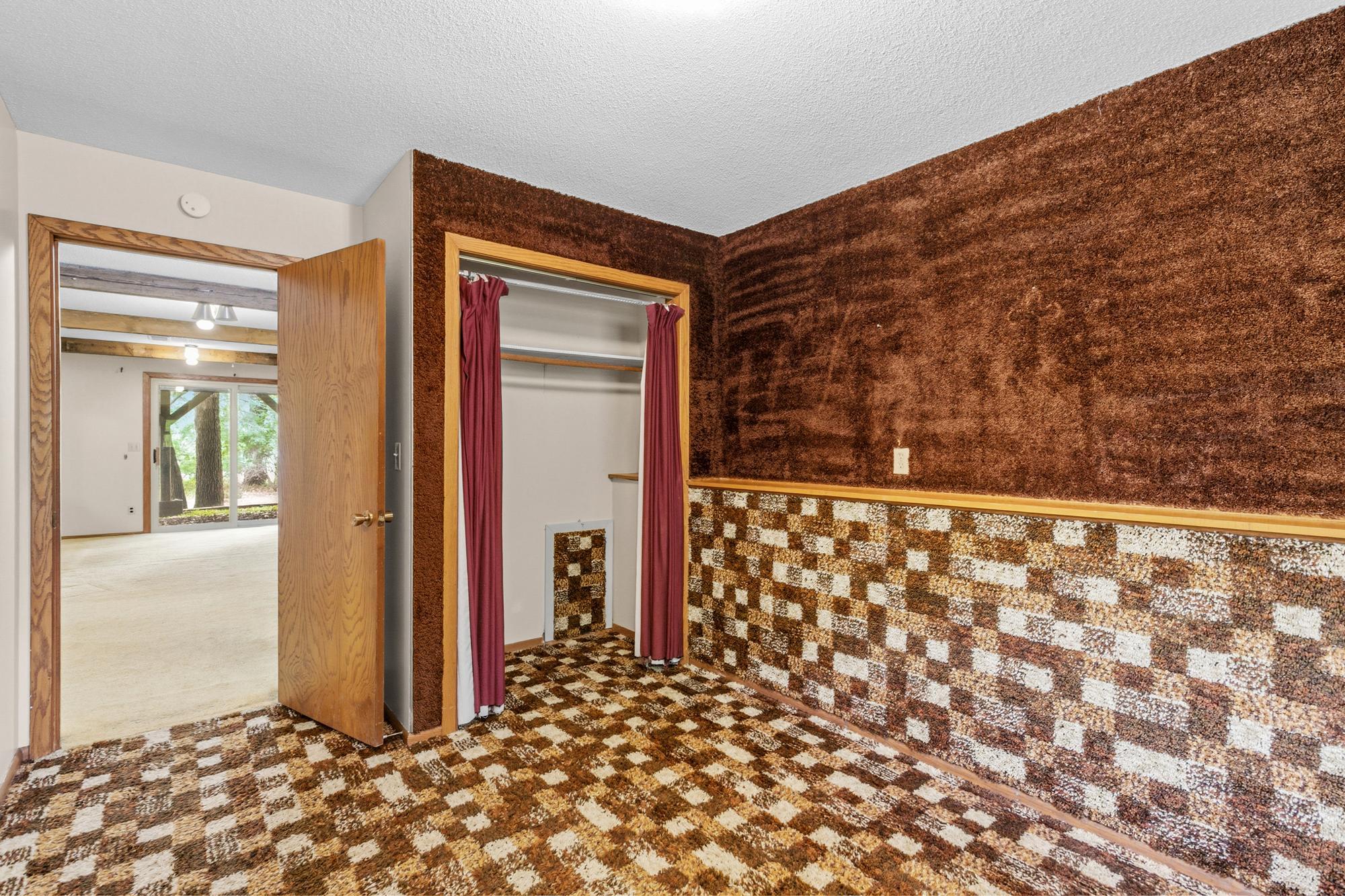 Even the hatch to the under-stairs crawl space gets it's 70's on!