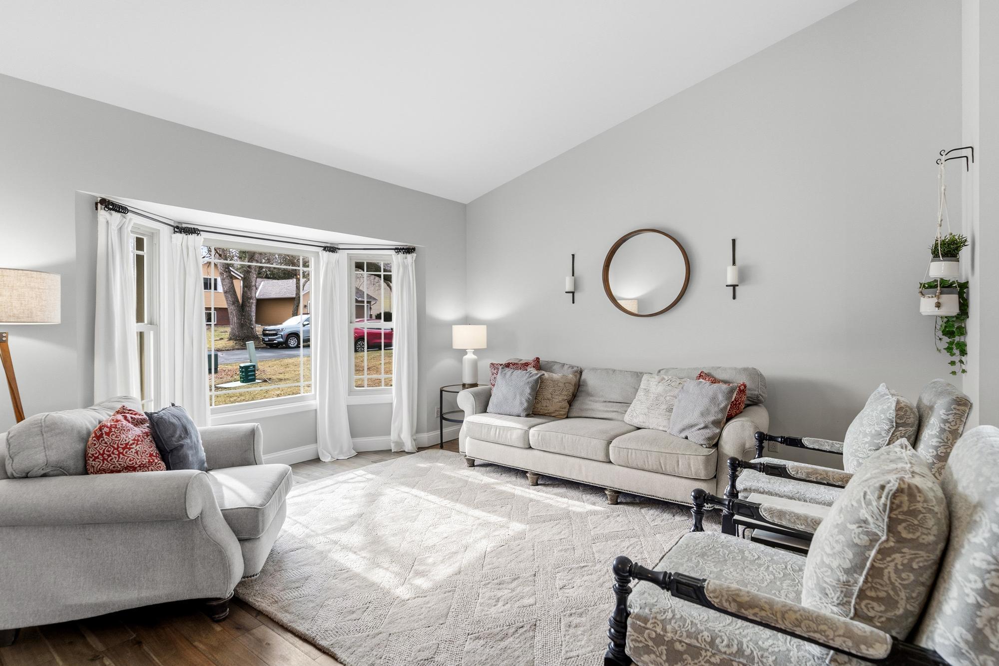 Big windows (and no walls) allow light to flow throughout this home's main floor.