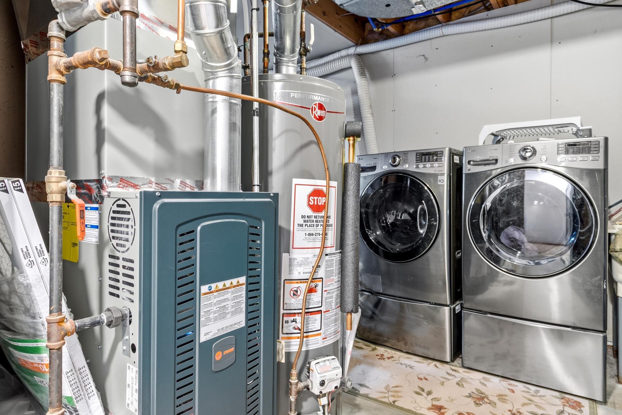 The furnace and A/C unit are brand new since October. To the right of the washer and dryer is a laundry tub. And to the left is a large storage area. Be sure to note this area on the floor plans to appreciate its size.