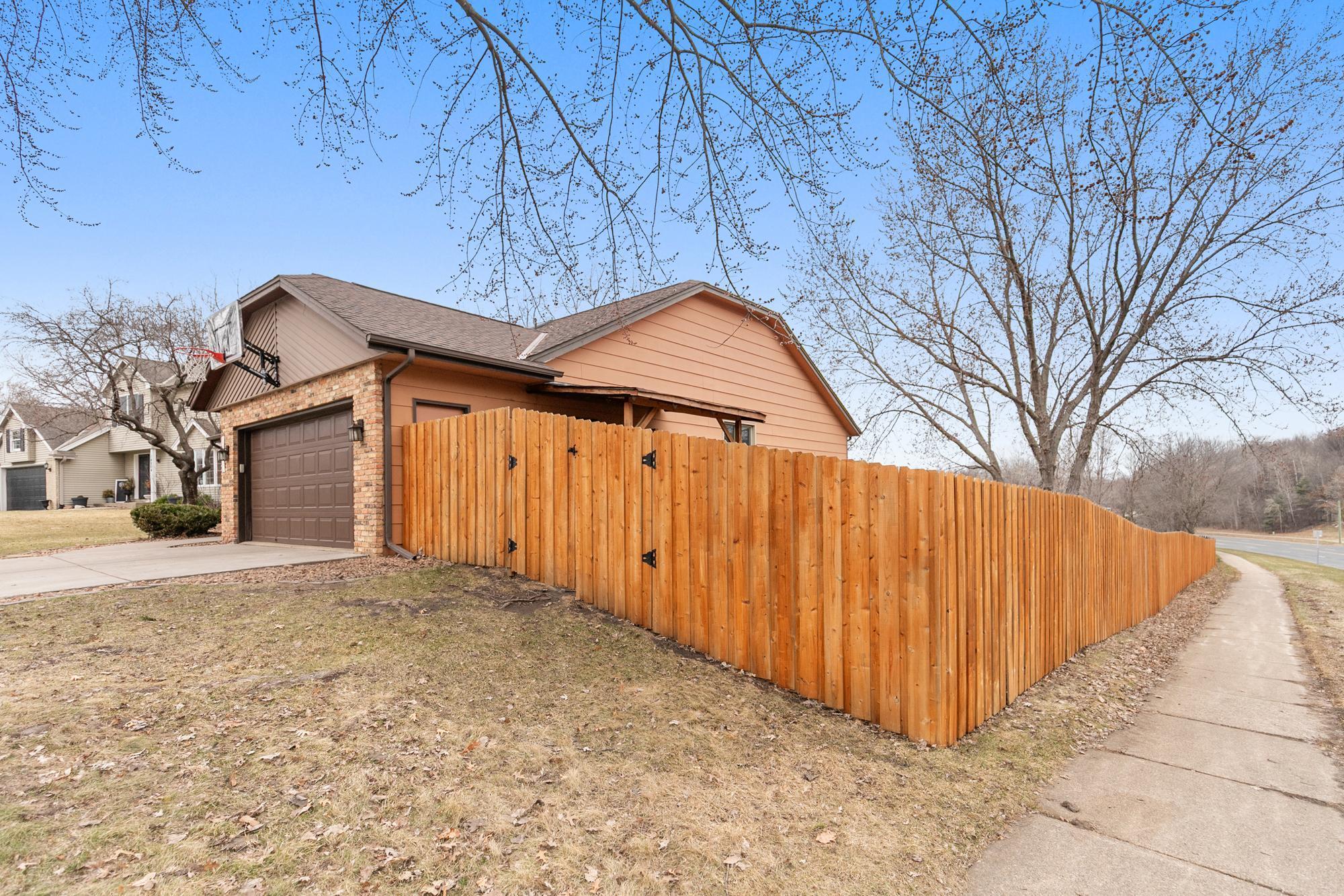Outside you'll be happy to have this very well-built privacy fence running the length of the yard along Southcross Drive.