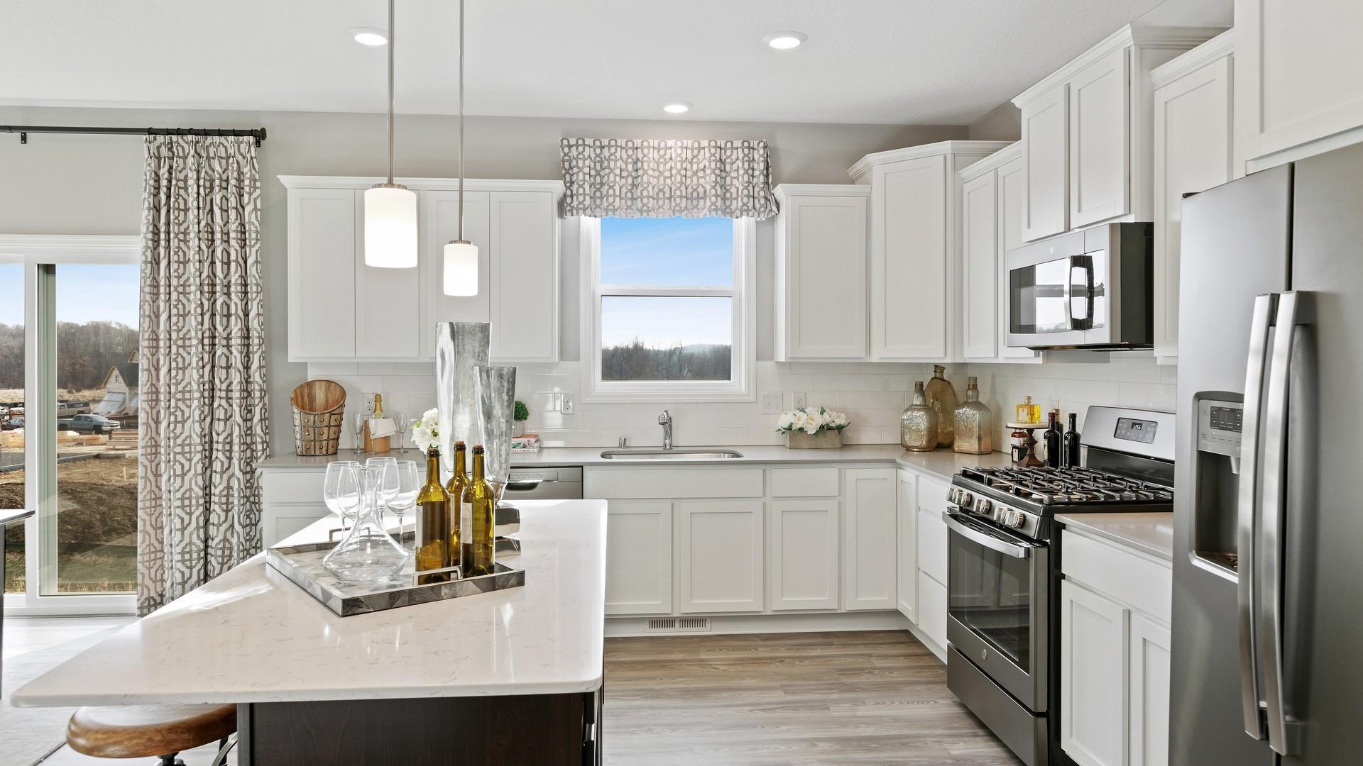 (Photo of decorated model, colors and features will vary) Another view of this spacious kitchen!
