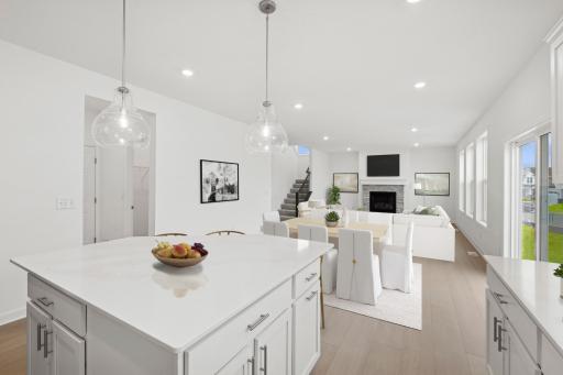 (Photo of model home, features will vary) Ample cabinetry storage, a stainless steel sink and under-cabinet task lighting are all included.jpg