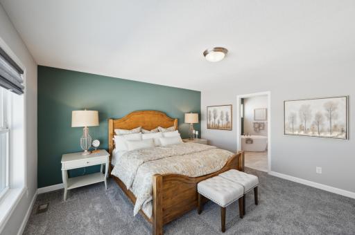 (Photo of model home, features will vary) The ownerâs suite is found on the second floor, complete with a cozy bedroom, an en-suite bathroom and a walk-in closet.