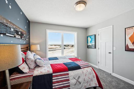 (Photo of model home, features will vary) Three secondary bedrooms can be found upstairs, just down the hall from the ownerâs suite.