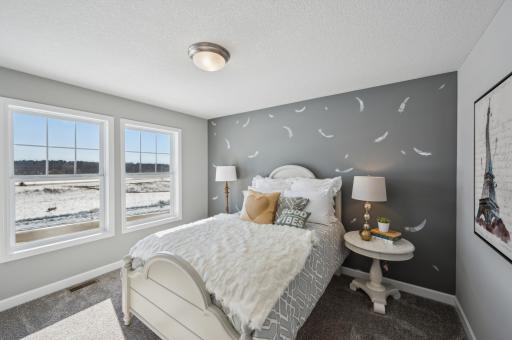 (Photo of model home, features will vary) Three secondary bedrooms can be found upstairs, just down the hall from the ownerâs suite.
