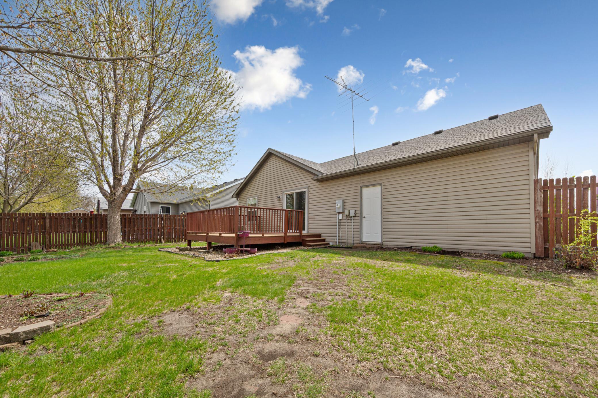 View of the back. Service door to the garage.