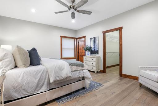 The generously sized primary suite is perfectly suited for single-level living if desired, combining convenience and elegance.