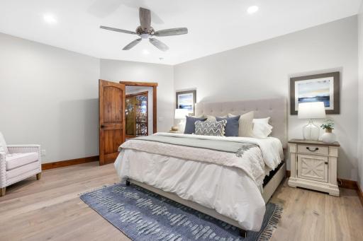 Enjoy engineered wood flooring and a spacious walk-in closet with a pocket door.