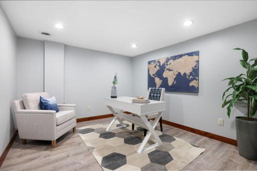 Adjacent flex room ideal for a media room, fitness space, or game area.