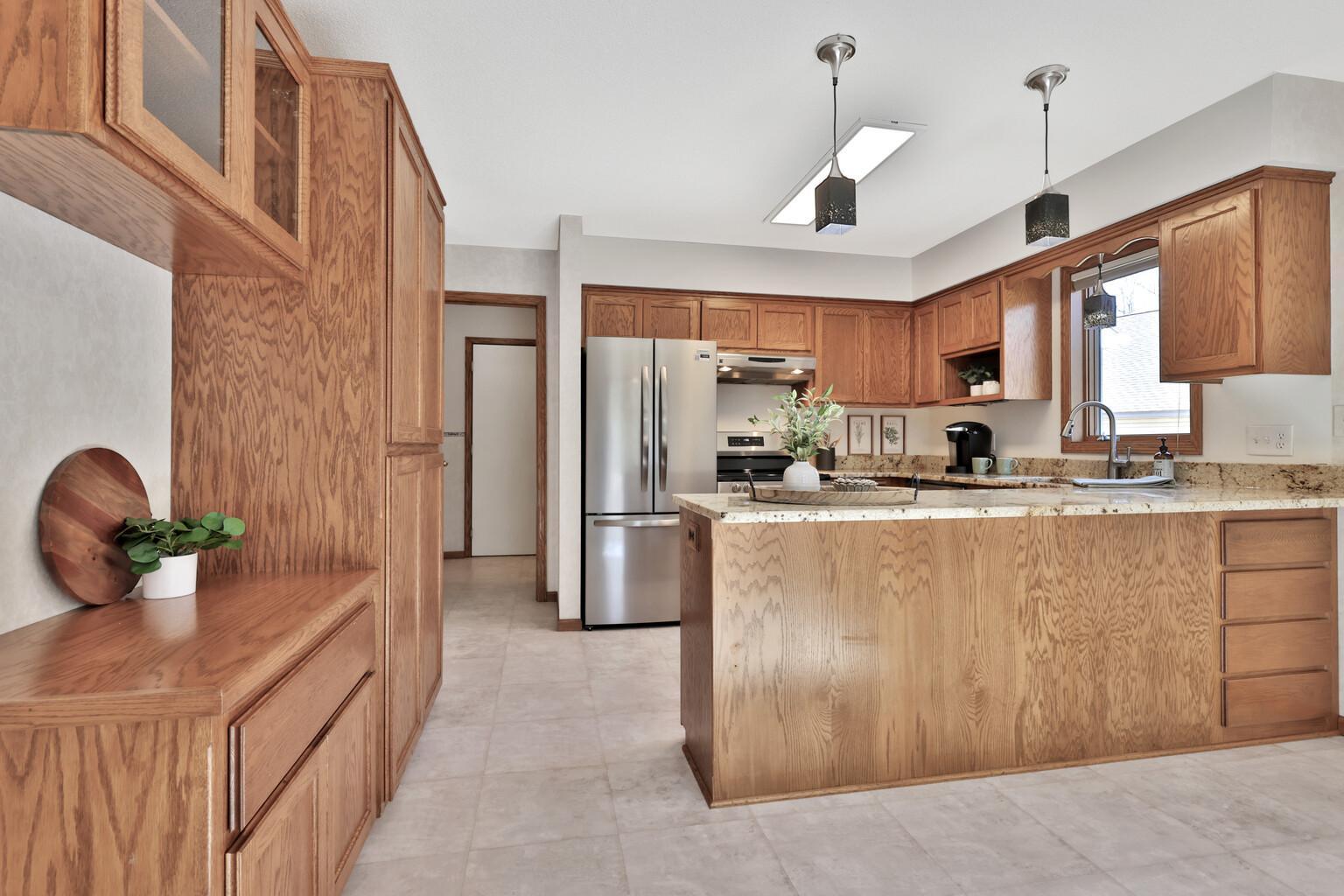 Dining towards kitchen, brand new stainless appliances
