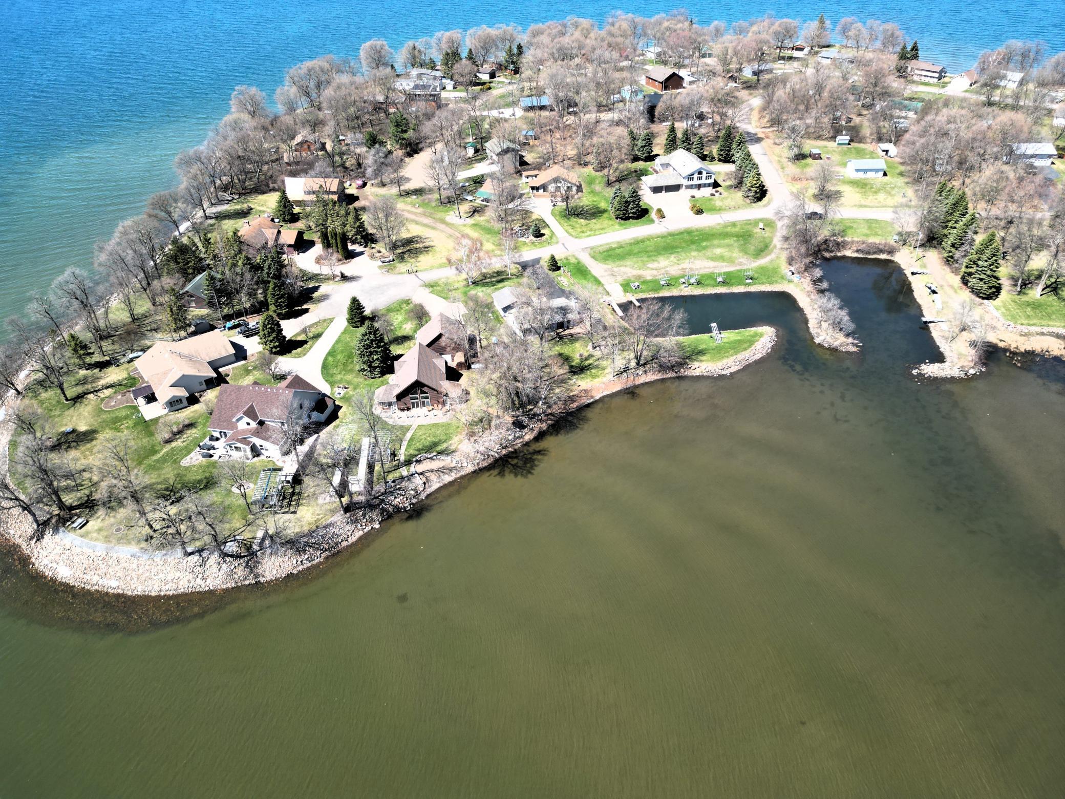 185' gradual frontage on the bay with the private shared harbor and boat launch close by.