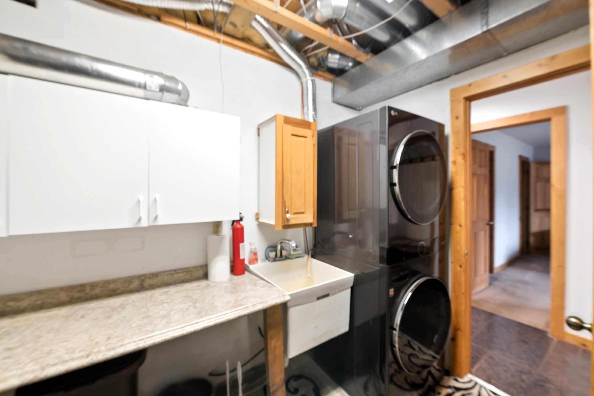 Main level laundry area and utility room.