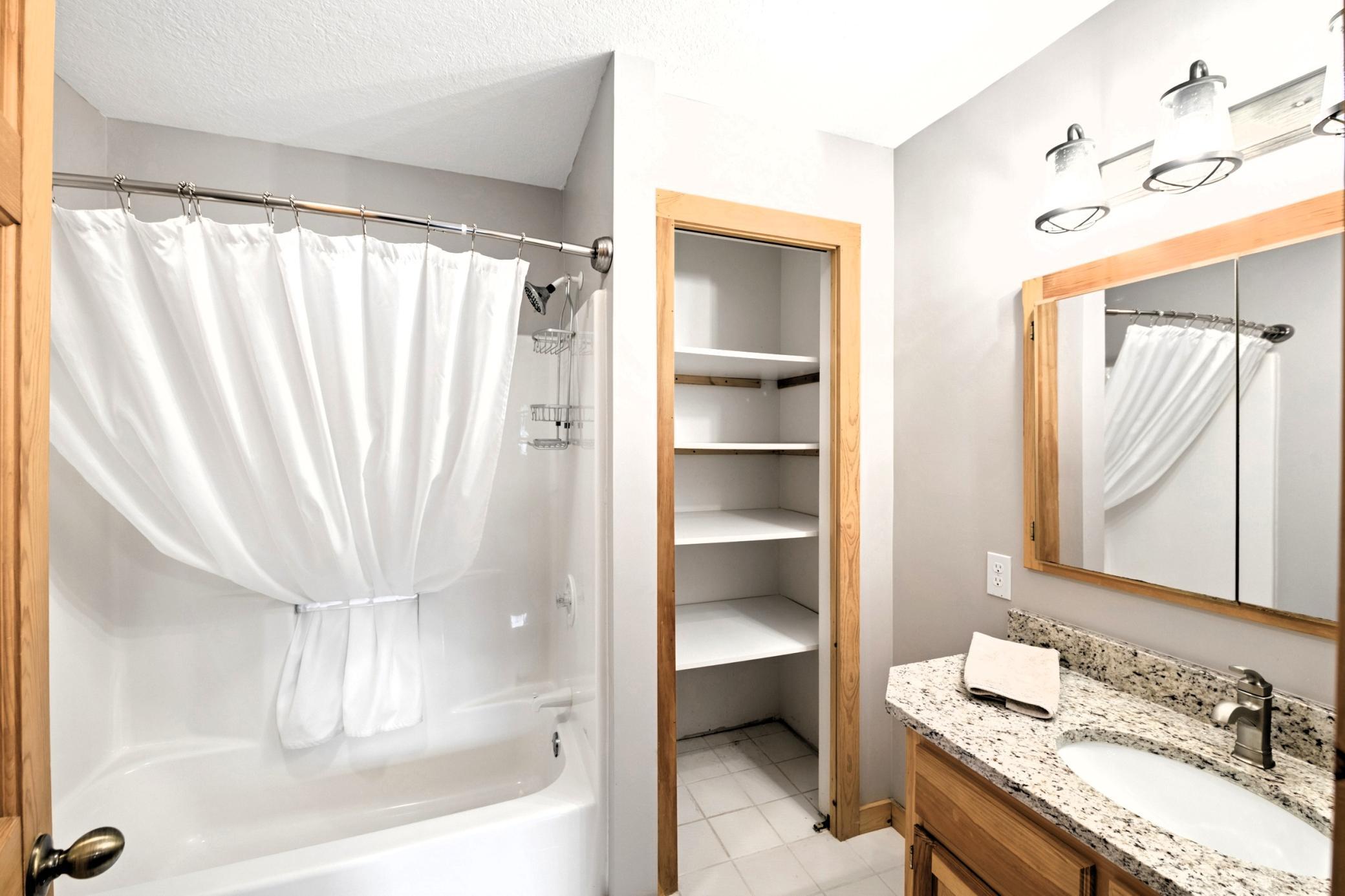 Main level primary full bath on the main level.