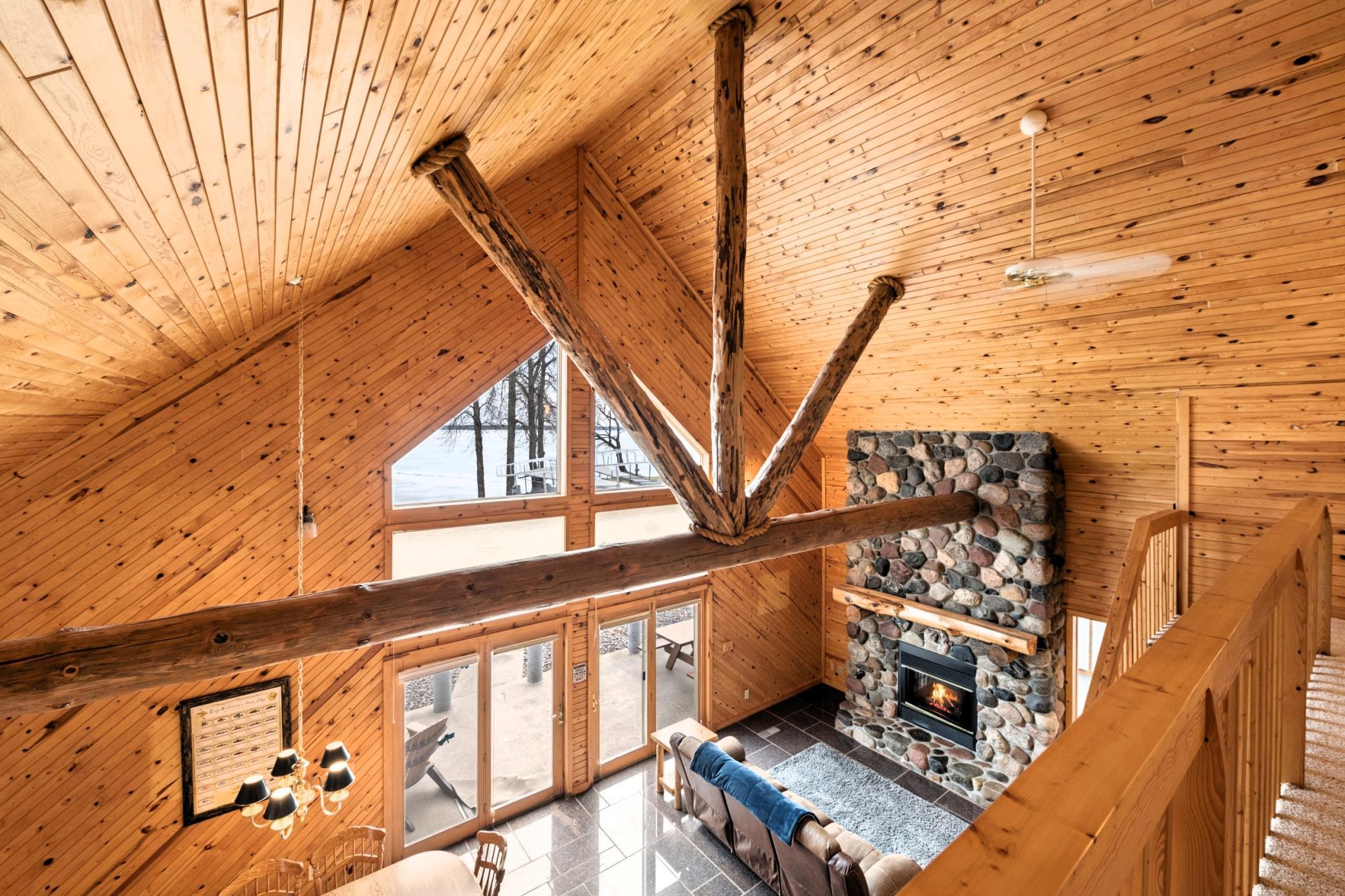 Incredible view looking out over the great room and lake.