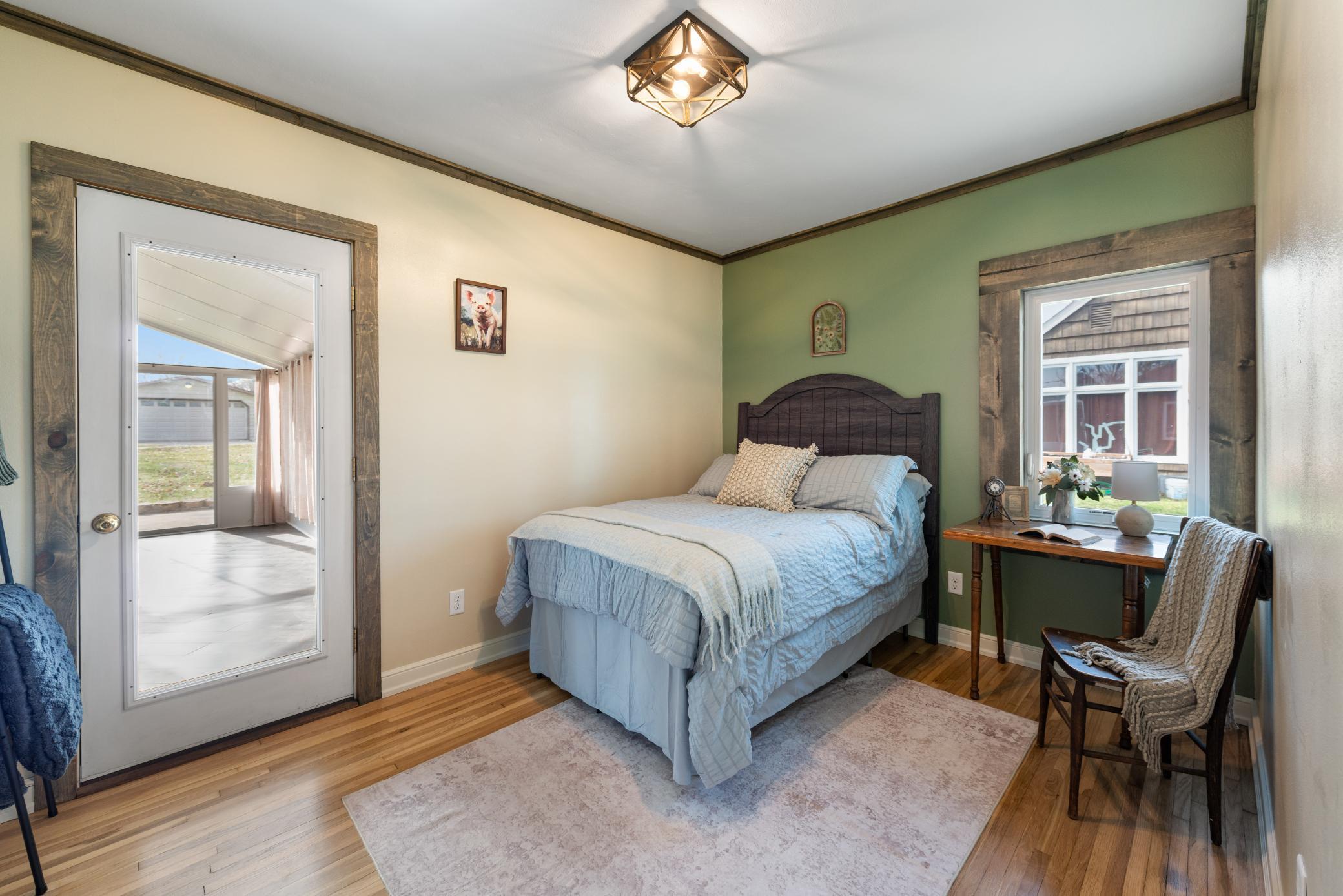 Bedroom 1 - access to the sunroom.jpg