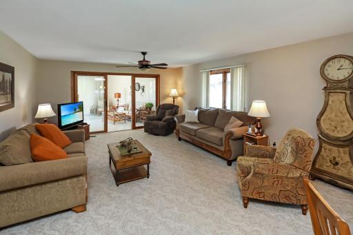 Spacious living room leading to the 4 season porch.