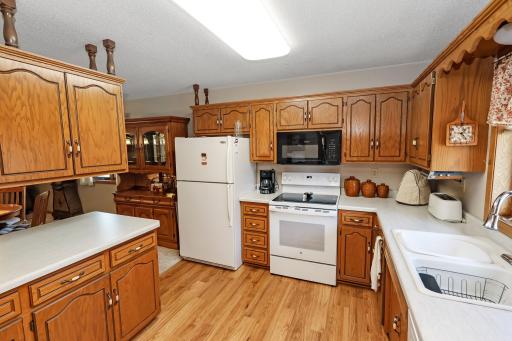 Bright kitchen with lots of cabinet space.